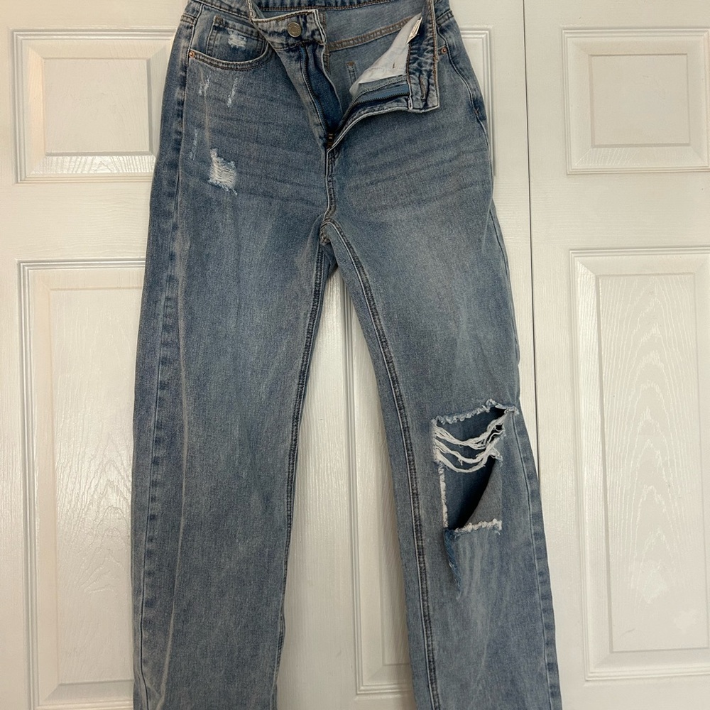 Women's Distressed Blue Jeans